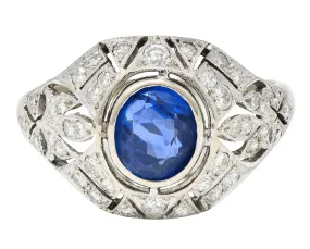 1960's Art Deco Revival 1.72 CTW Oval Cut Sapphire Diamond 14 Karat White Gold Fleur-De-Lis Vintage Bombay Dinner Ring