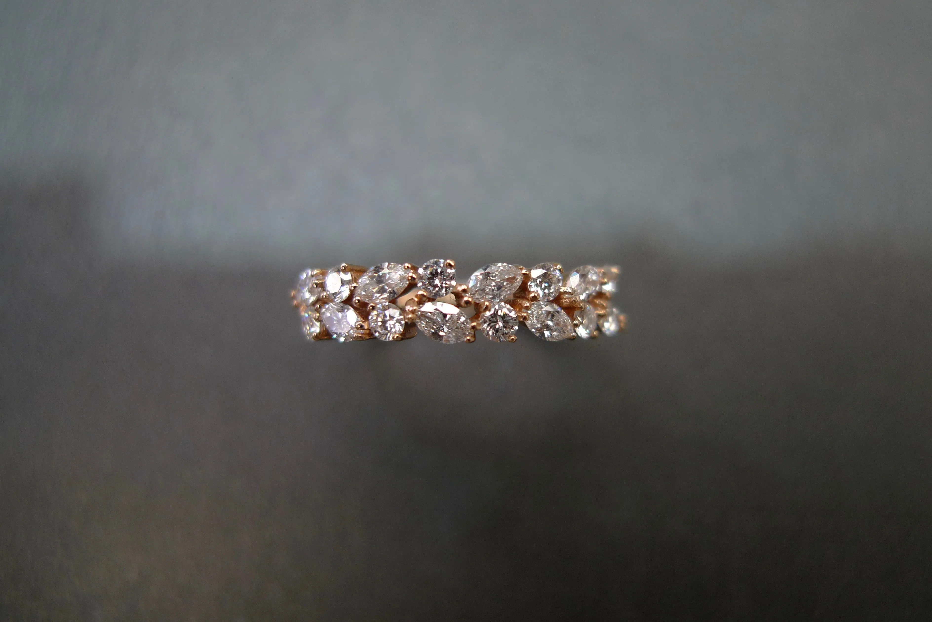 Marquise Cut Diamond and Round Brilliant Cut Diamond Ring in Rose Gold